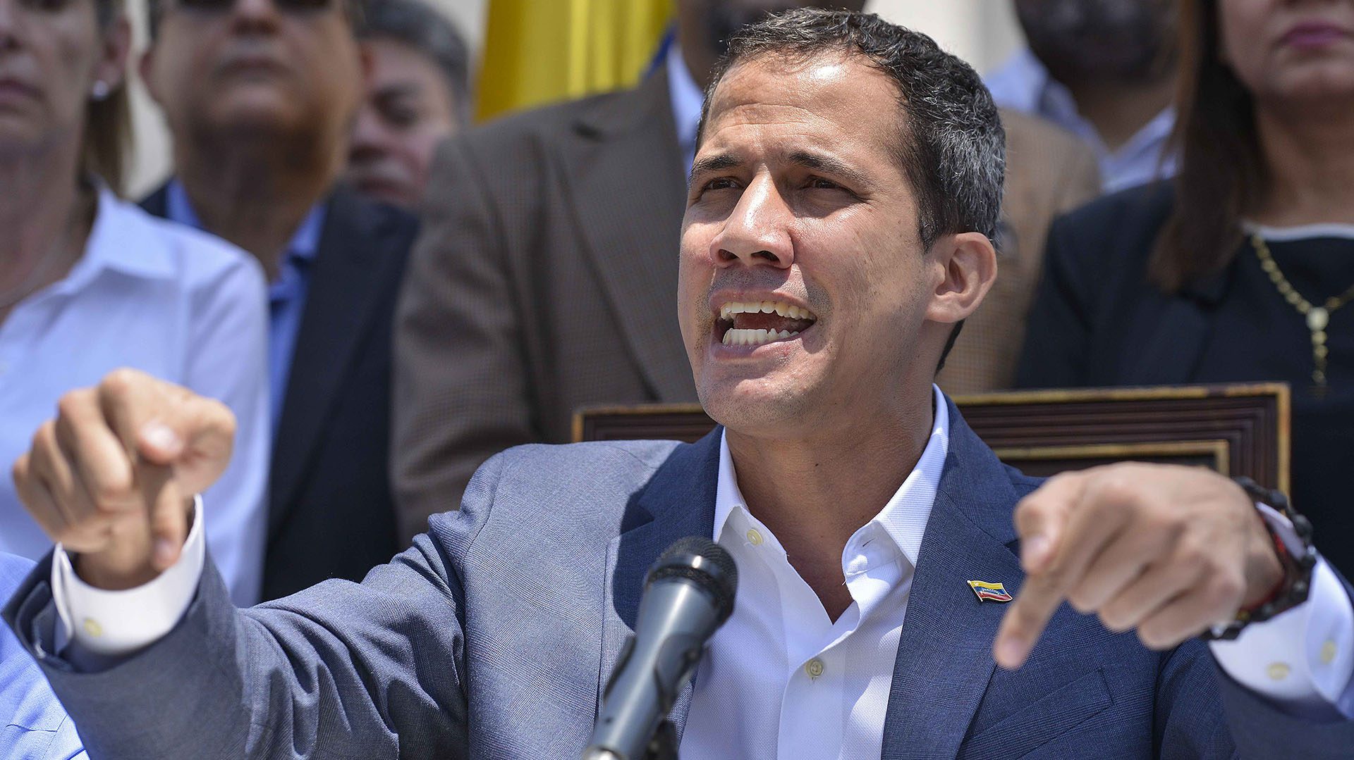 Venezuelan opposition leader and self-proclaimed acting president Juan Guaido speaks during a press conference at the Venezuelan National Assembly in Caracas on March 10, 2019. - Sunday is the third day Venezuelans remain without communications, electricity or water, in an unprecedented power outage that already left 15 patients dead and threatens with extending indefinitely, increasing distress for the severe political and economic crisis hitting the oil-rich South American nation. (Photo by Matias DELACROIX / AFP)
