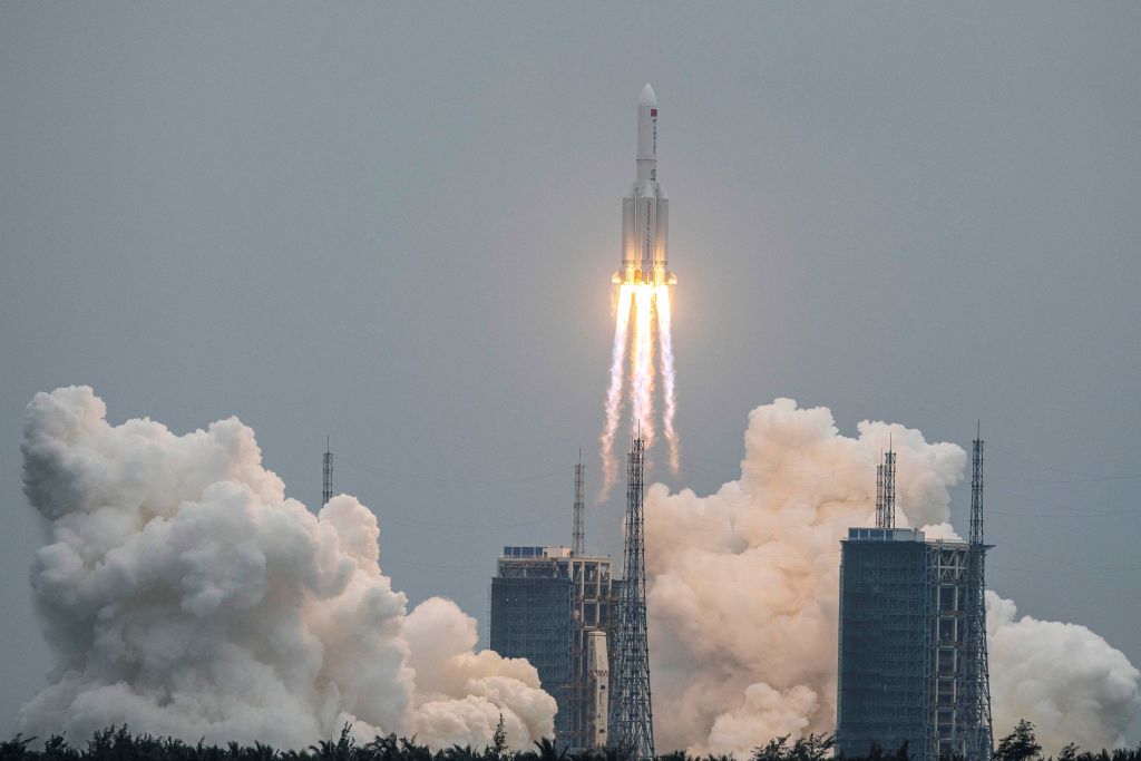 A Long March 5B rocket, carrying China's Tianhe space station core module, lifts off from the Wenchang Space Launch Center in southern China's Hainan province on April 29, 2021. - China OUT (Photo by STR / AFP) / China OUT (Photo by STR/AFP via Getty Images)